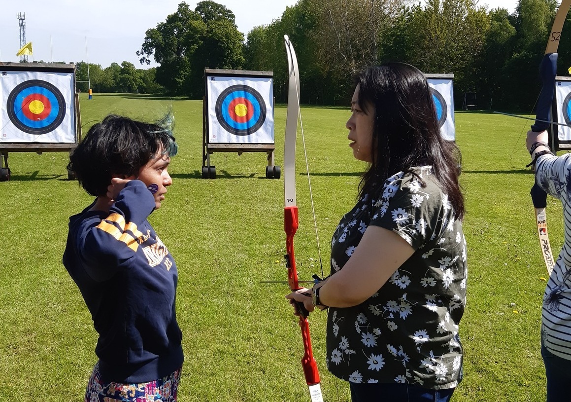 Archer being coached