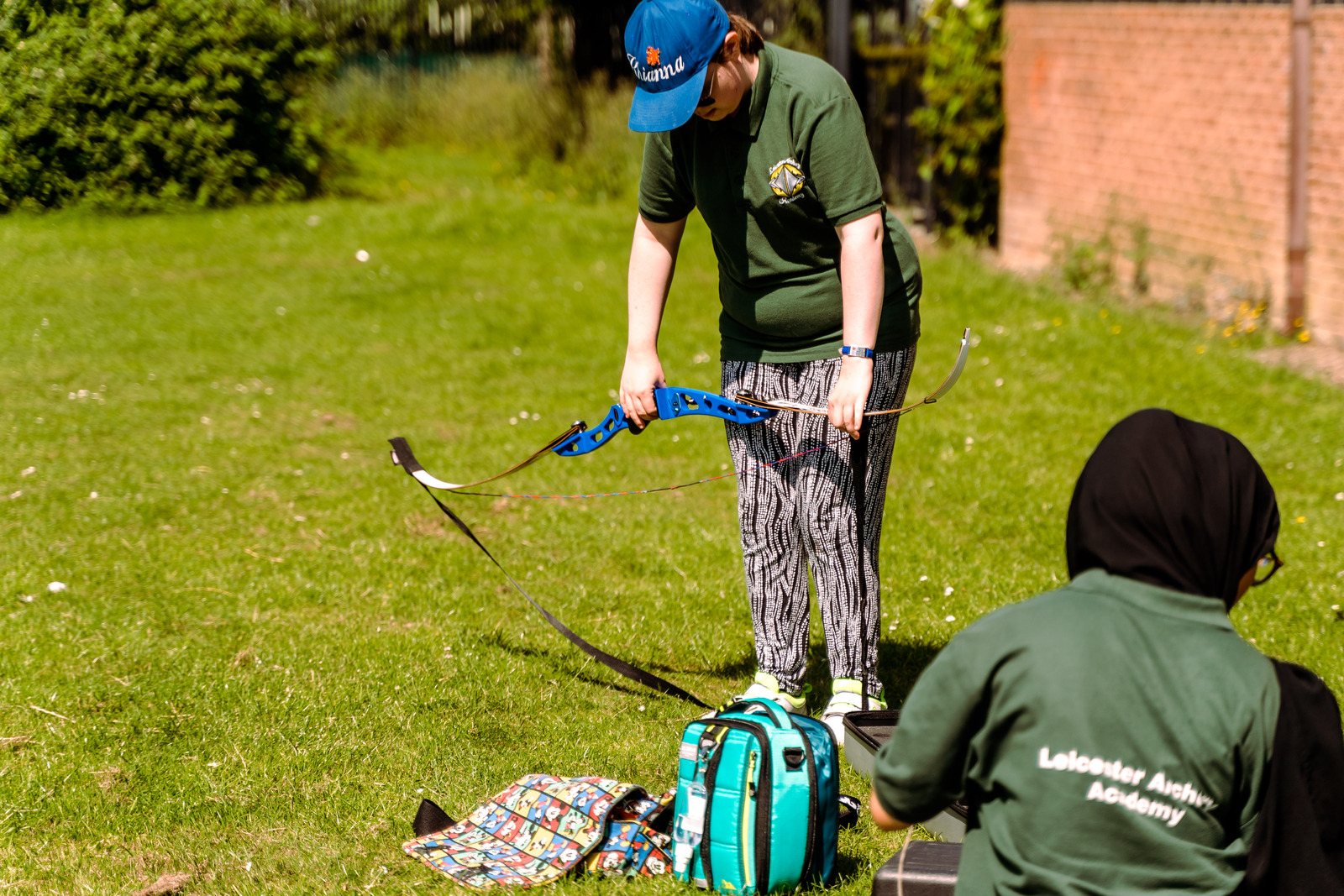 Archer stringing a bow